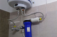 Installed Parashu® Geyser Filter with KDF in a bathroom